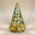 Load image into Gallery viewer, (jasper gold)
Jasper gold large ceramic Starlight Tree made with ashes, a radiant handcrafted cremation memorial by Ahava Memorials glowing through star-shaped openings.