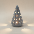 Load image into Gallery viewer, (ice)
Handcrafted ice-blue ceramic Starlight Tree made with ashes, a glowing cremation memorial by Ahava Memorials with star-shaped light openings.