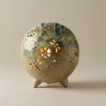 Load image into Gallery viewer, (jasper gold)
Golden ceramic cremation memorial light made with ashes, radiating warmth, comfort, and timeless elegance.