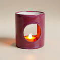 Load image into Gallery viewer, (sunstone red)
Sunstone red ceramic candle holder made with ashes, symbolizing warmth, love, and remembrance in radiant form.