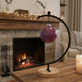 Load image into Gallery viewer, Collection of Ahava Memorials ball ornaments in multiple glaze colors, handcrafted with ashes and arranged together on a table as modern memorial art pieces.
