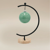 (copper)
Copper ceramic ball ornament made with ashes, a handcrafted memorial artwork symbolizing light, connection, and cherished memories.