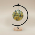 Load image into Gallery viewer, (jasper gold)
Jasper gold ceramic ball ornament made with ashes, a luminous handcrafted cremation keepsake celebrating warmth and remembrance.
