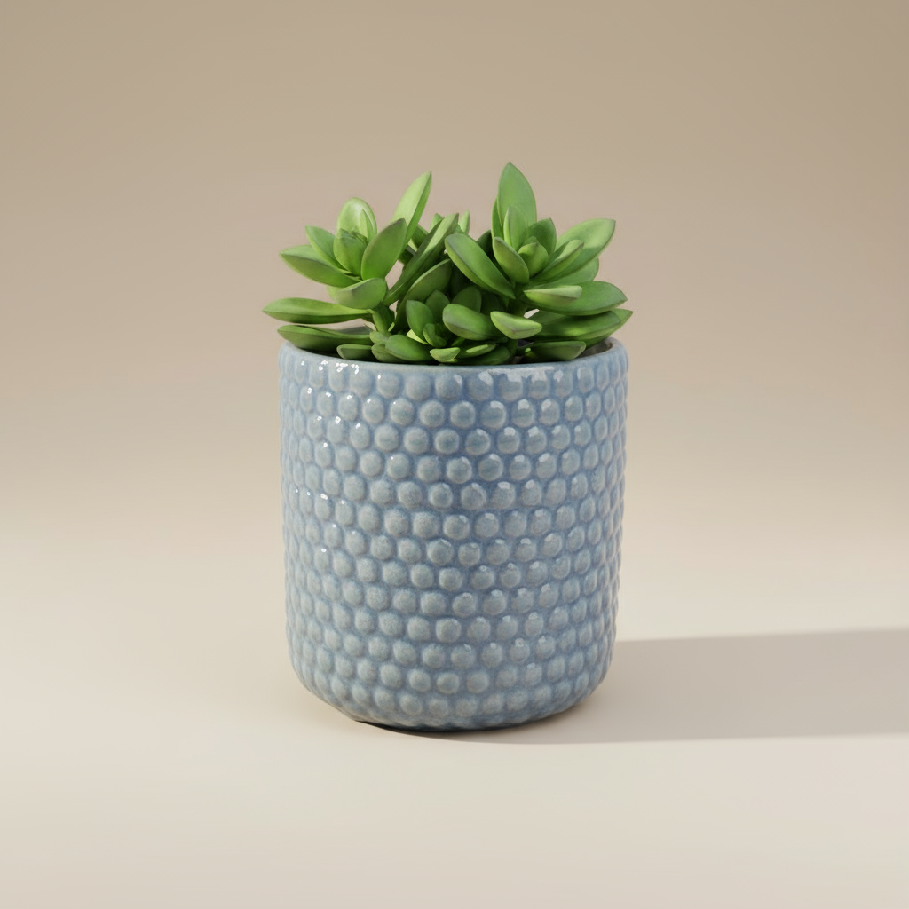(ice)
Handcrafted ice-blue ceramic beaded planter made with ashes, a peaceful cremation memorial and home art piece by Ahava Memorials.