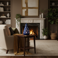 Load image into Gallery viewer, Handcrafted ceramic Starlight Tree by Ahava Memorials, made with ashes and displayed on a home mantel beside candles and keepsakes as a peaceful cremation memorial.
