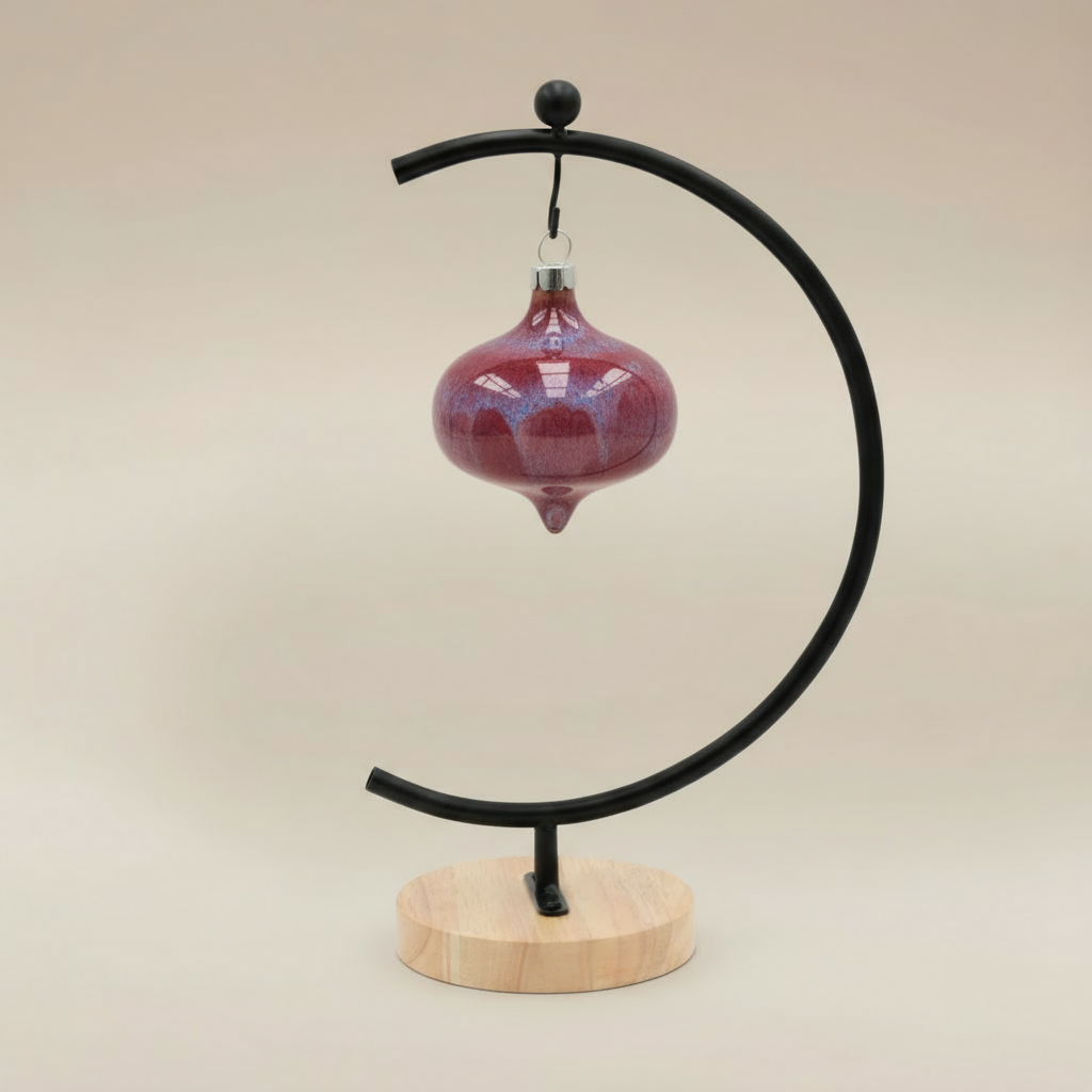 (sunstone-red)
Sunstone red ceramic curvy retro ornament made with ashes, handcrafted by Ahava Memorials to represent love, strength, and devotion.
