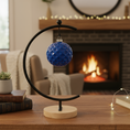 Load image into Gallery viewer, Collection of Ahava Memorials facet ornaments in multiple glaze colors, handcrafted with ashes and arranged together in a bright, peaceful home interior as meaningful memorial art.
