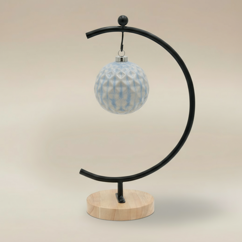 (Ice)
Handcrafted ice-blue ceramic facet ornament made with ashes, a peaceful cremation keepsake by Ahava Memorials.