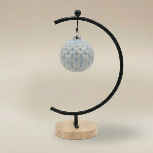 (Ice)
Handcrafted ice-blue ceramic facet ornament made with ashes, a peaceful cremation keepsake by Ahava Memorials.