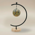 Load image into Gallery viewer, (Jasper Gold)
Jasper gold ceramic facet ornament made with ashes, a luminous handcrafted cremation keepsake by Ahava Memorials.
