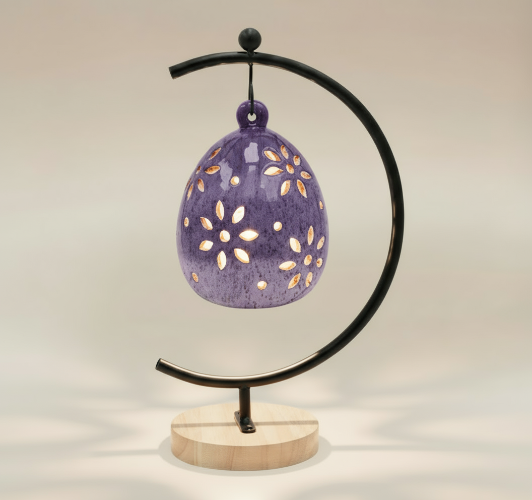 (lavender)
Back view of the lavender floral luminary by Ahava Memorials, handcrafted with ashes and shown illuminated from within by a candle as an elegant memorial artwork.