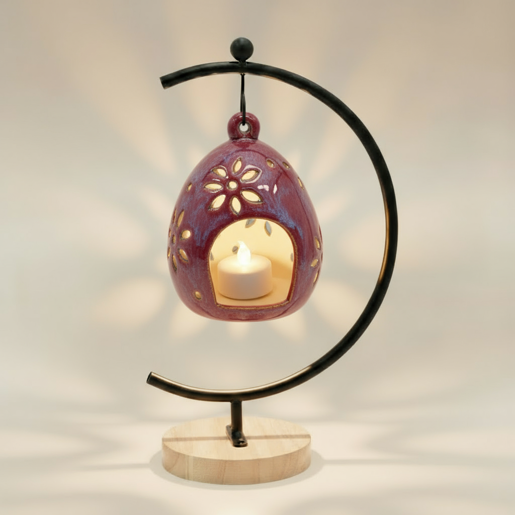 (sunstone red)
Sunstone red ceramic floral luminary made with ashes, handcrafted by Ahava Memorials and glowing warmly through star and petal cutouts with a candle inside.