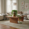 Load image into Gallery viewer, Ahava Memorials large cylinder ceramic vase made with ashes, illuminated by candlelight on a minimalist table as a handcrafted cremation memorial centerpiece.

