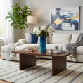 Load image into Gallery viewer, Ahava Memorials handcrafted narrow cylinder ceramic vase made with ashes, displayed in a cozy home setting with soft lighting as a peaceful cremation memorial.

