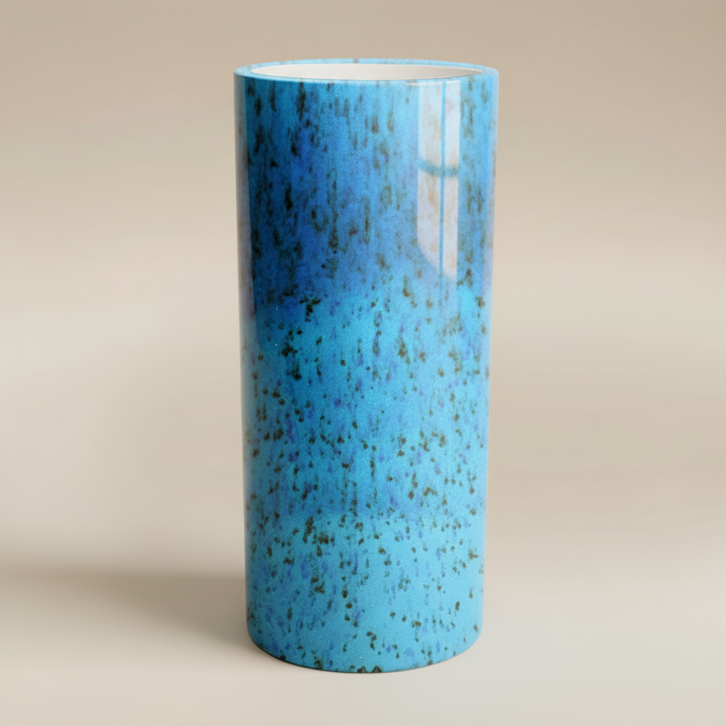 (agate blue)
Agate blue narrow cylinder ceramic vase made with ashes, handcrafted by Ahava Memorials as a calm and elegant cremation memorial art piece.