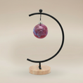 Load image into Gallery viewer, (sunstone red)
Sunstone red ceramic paw ball ornament made with pet ashes, handcrafted by Ahava Memorials to symbolize love, loyalty, and remembrance.
