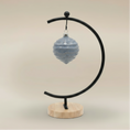Load image into Gallery viewer, (ice)
Handcrafted ice-blue ceramic wave ornament made with ashes, a peaceful cremation keepsake by Ahava Memorials.
