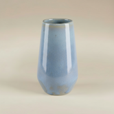 (ice)
Handcrafted ice-blue ceramic bouquet vase made with ashes, a serene cremation memorial by Ahava Memorials.