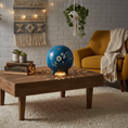 Load image into Gallery viewer, Dragonfly Luminary Light by Ahava Memorials. Living room with a wooden coffee table, blue decorative lamp, and yellow armchair.
