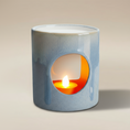 Load image into Gallery viewer, (ice)
Handcrafted ice-blue ceramic candle holder made with ashes, a radiant memorial keepsake by Ahava Memorials.
