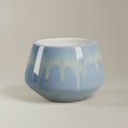 Load image into Gallery viewer, (ice)
A white ceramic tulip planter with a smooth, glazed finish.
