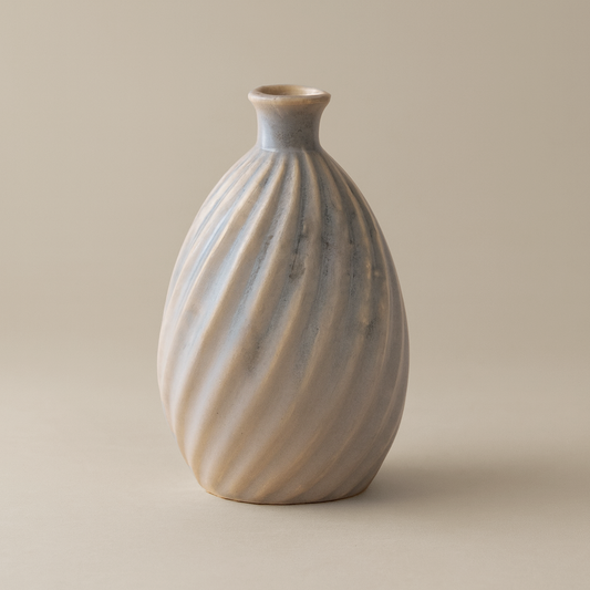 (ice)
Handcrafted ice-blue ceramic cremation memorial vase made with ashes, symbolizing peace and clarity.