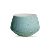 (copper)
A ceramic tulip planter with a green and white speckled pattern.